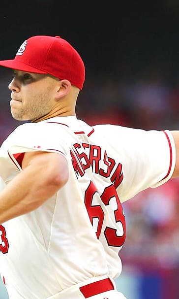 Masterson beats Brewers in his debut as Cardinal